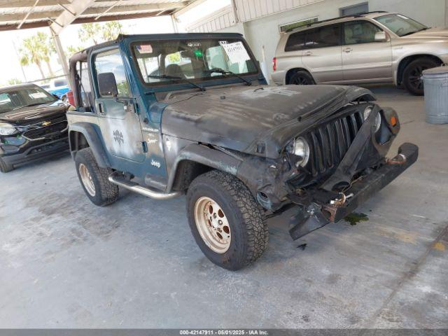  Salvage Jeep Wrangler